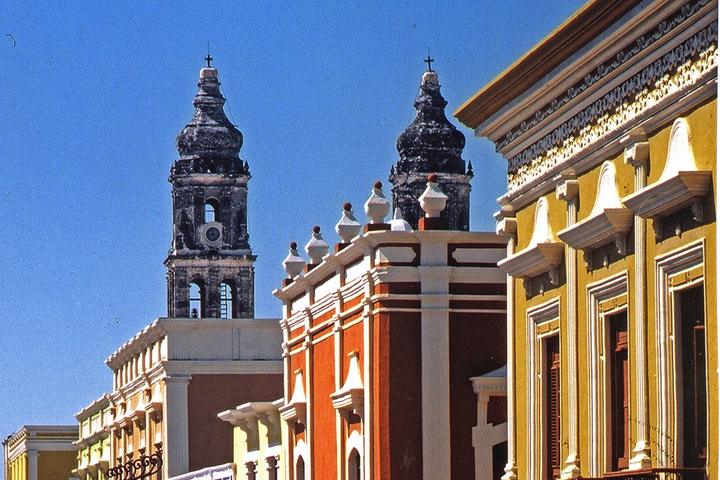 The cathedral towers above colorful facades in the historic center of Campeche.